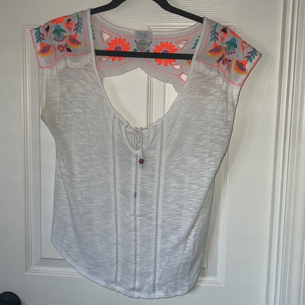 Super cute summery top. Worn a few time but in great condition.